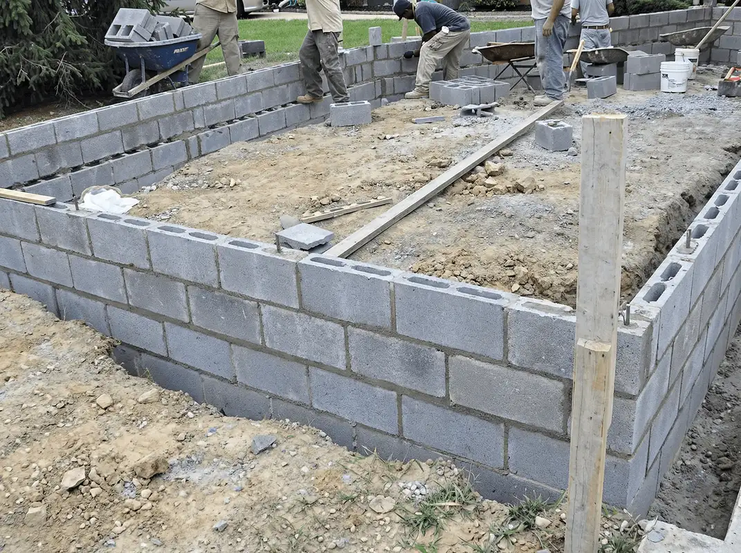 Professionals building a foundation with blocks in Syracuse, NY